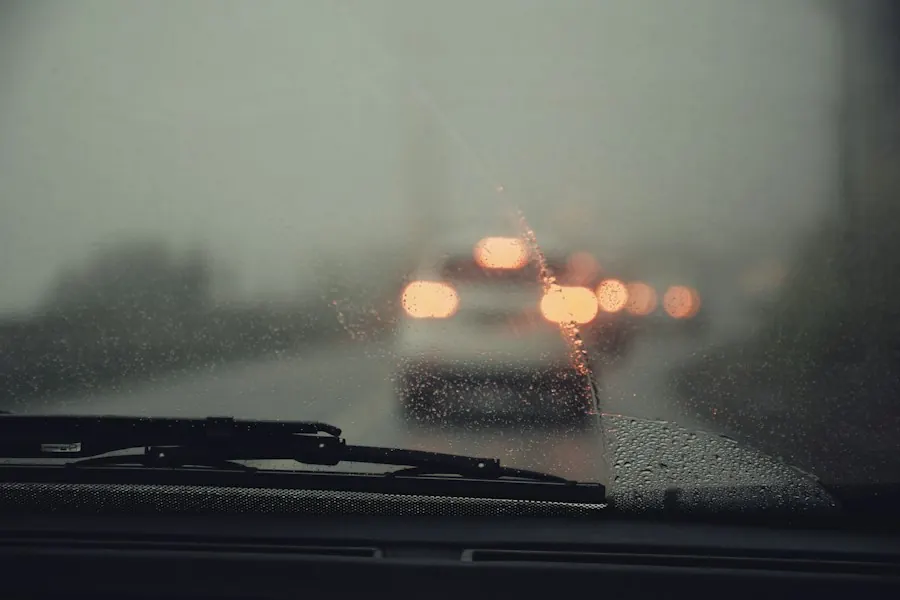 View through a rain-covered windshield with wipers